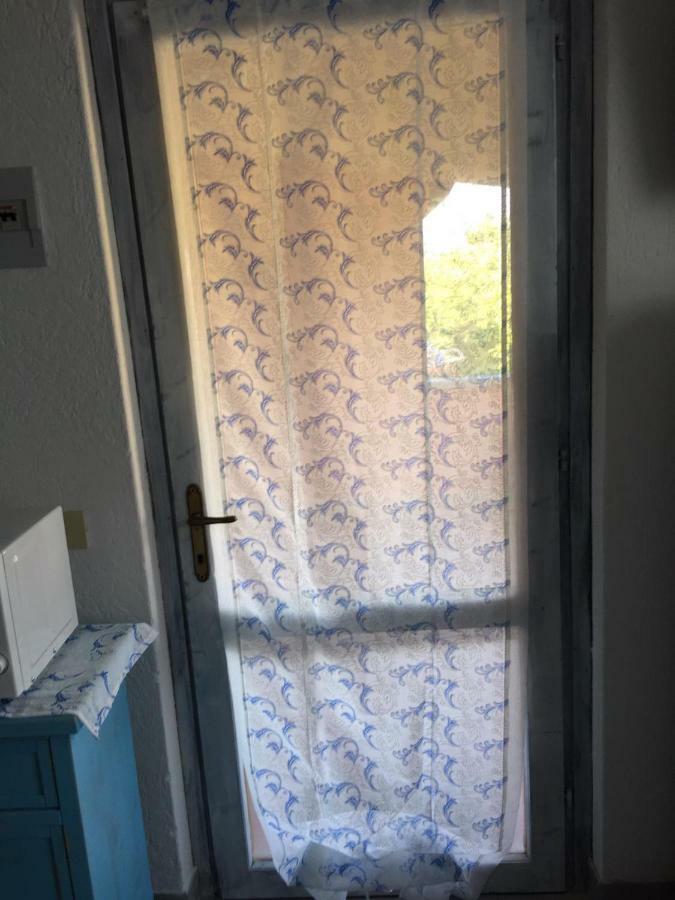 Bilocale Residence Gli Ulivi San Teodoro سان تيودورو المظهر الخارجي الصورة